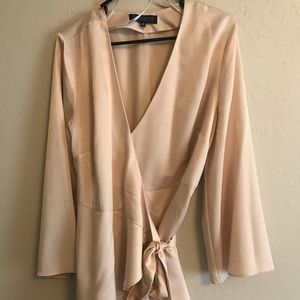 Cream colored, satin top.